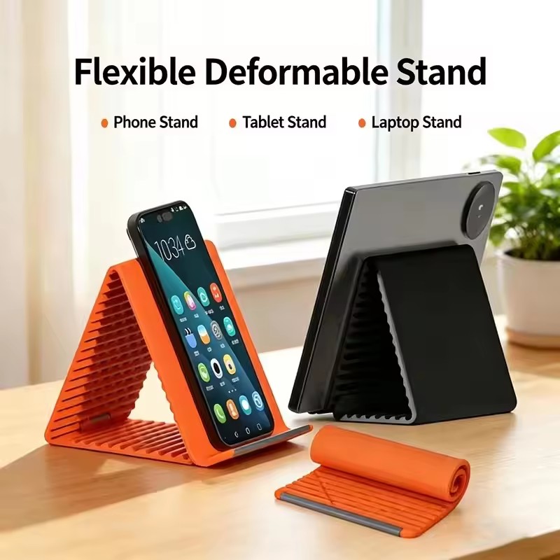 Laptop Accessories Distributor - ขาตั้งโทรศัพท์แบบพกพาซิลิโคนสำหรับวางบนโต๊ะ แท็บเล็ต แล็ปท็อป ดีไซน์สร้างสรรค์ ยืดหยุ่น พับได้